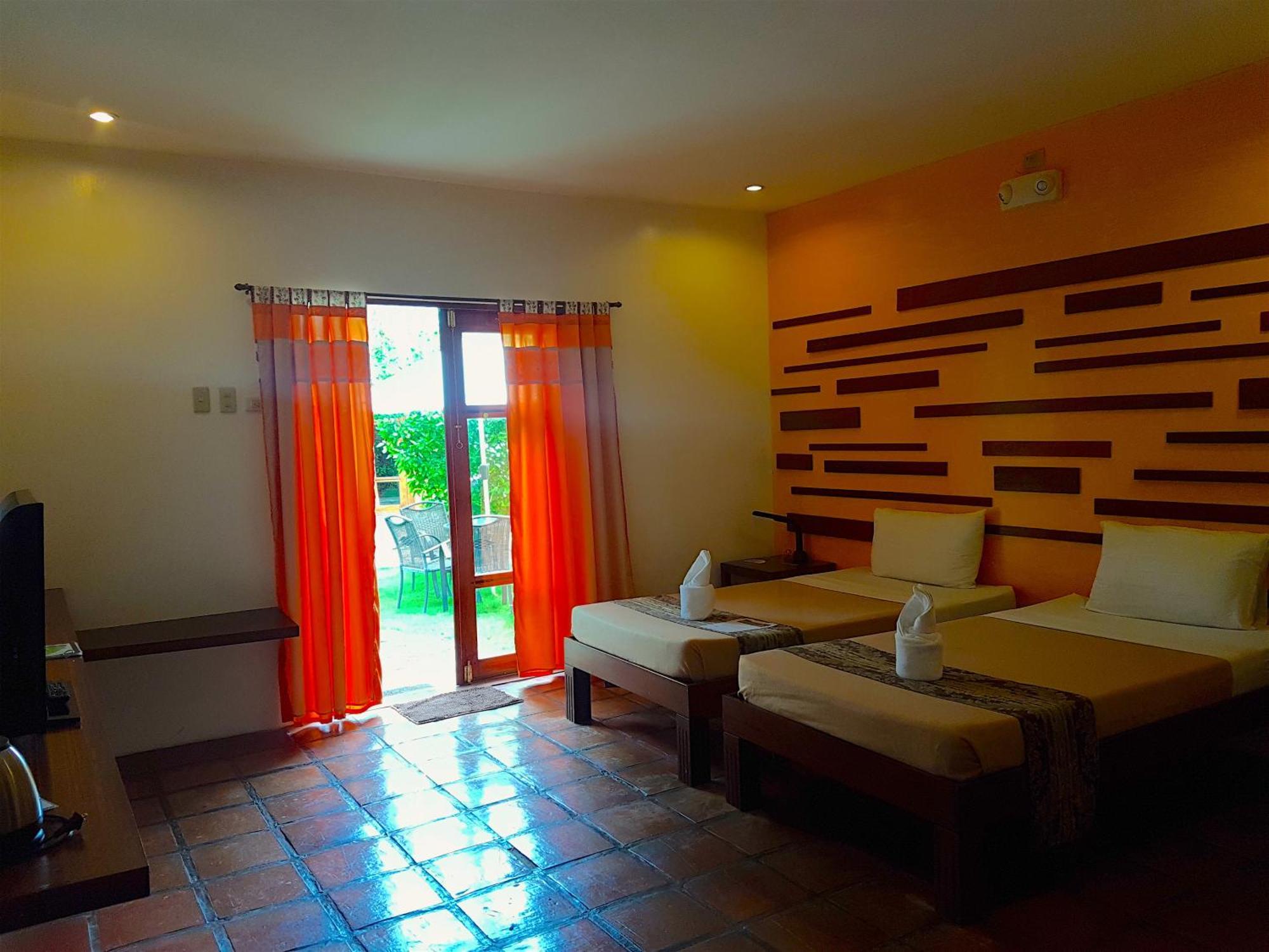 Acacia Tree Garden Hotel Puerto Princesa Buitenkant foto