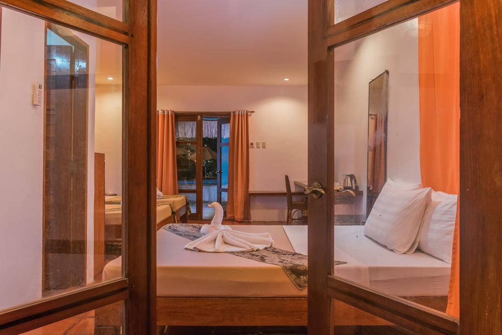 Acacia Tree Garden Hotel Puerto Princesa Buitenkant foto